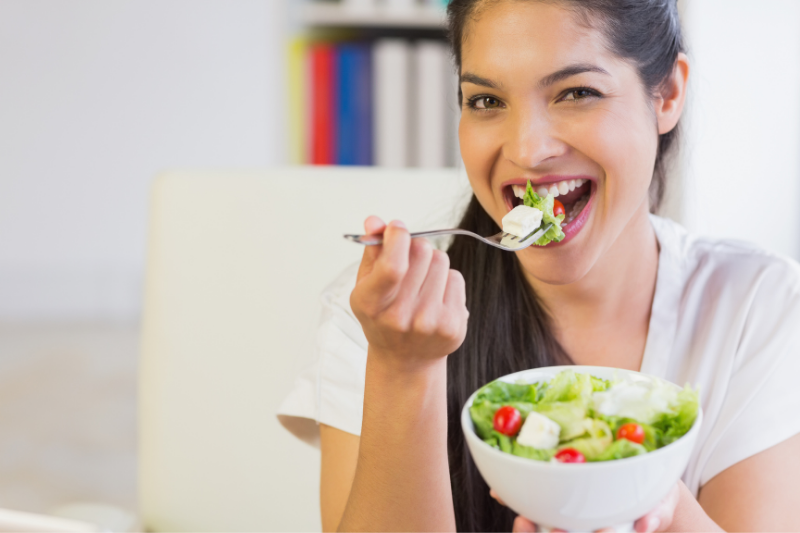 Female eating salad
