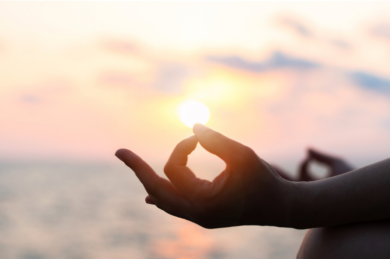 meditation, hands at beach