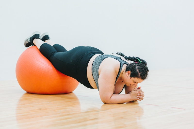 woman on a medicine ball