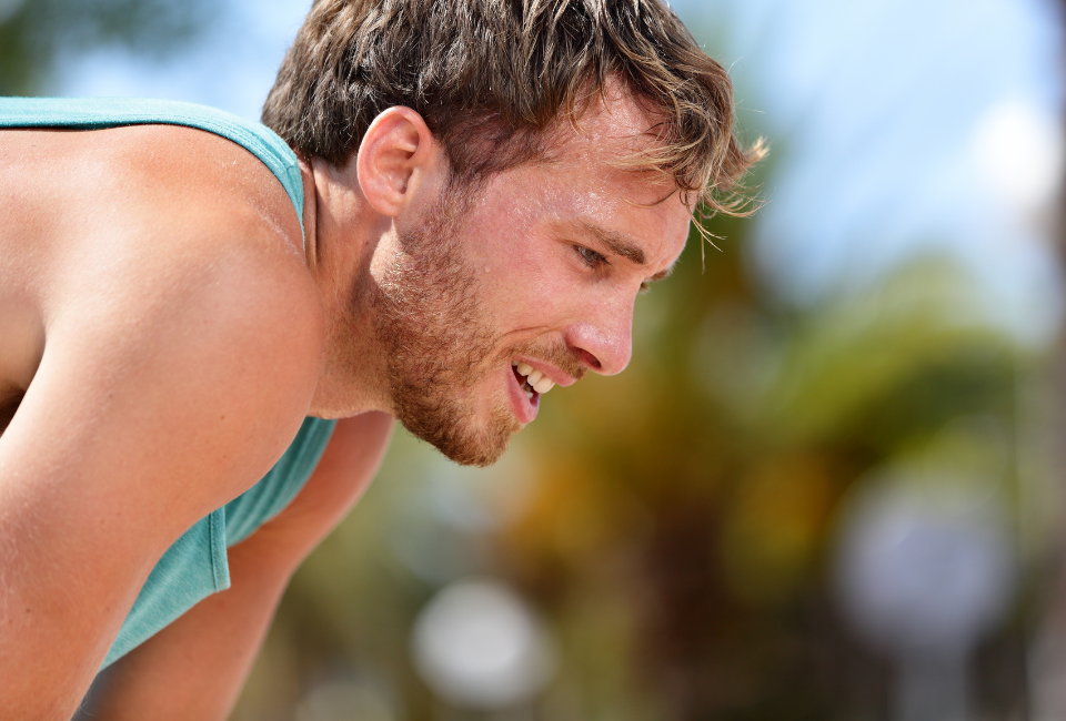 man leaning over after a run