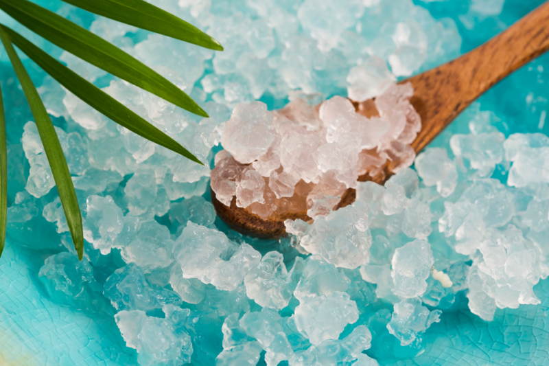 Water Kefir grains on a wooden spoon