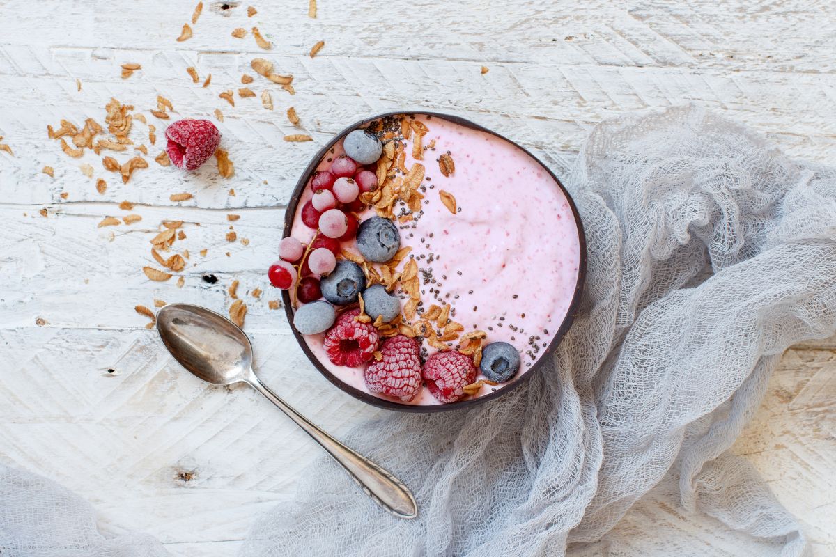 A delicious pink berry healthy smoothie bowl